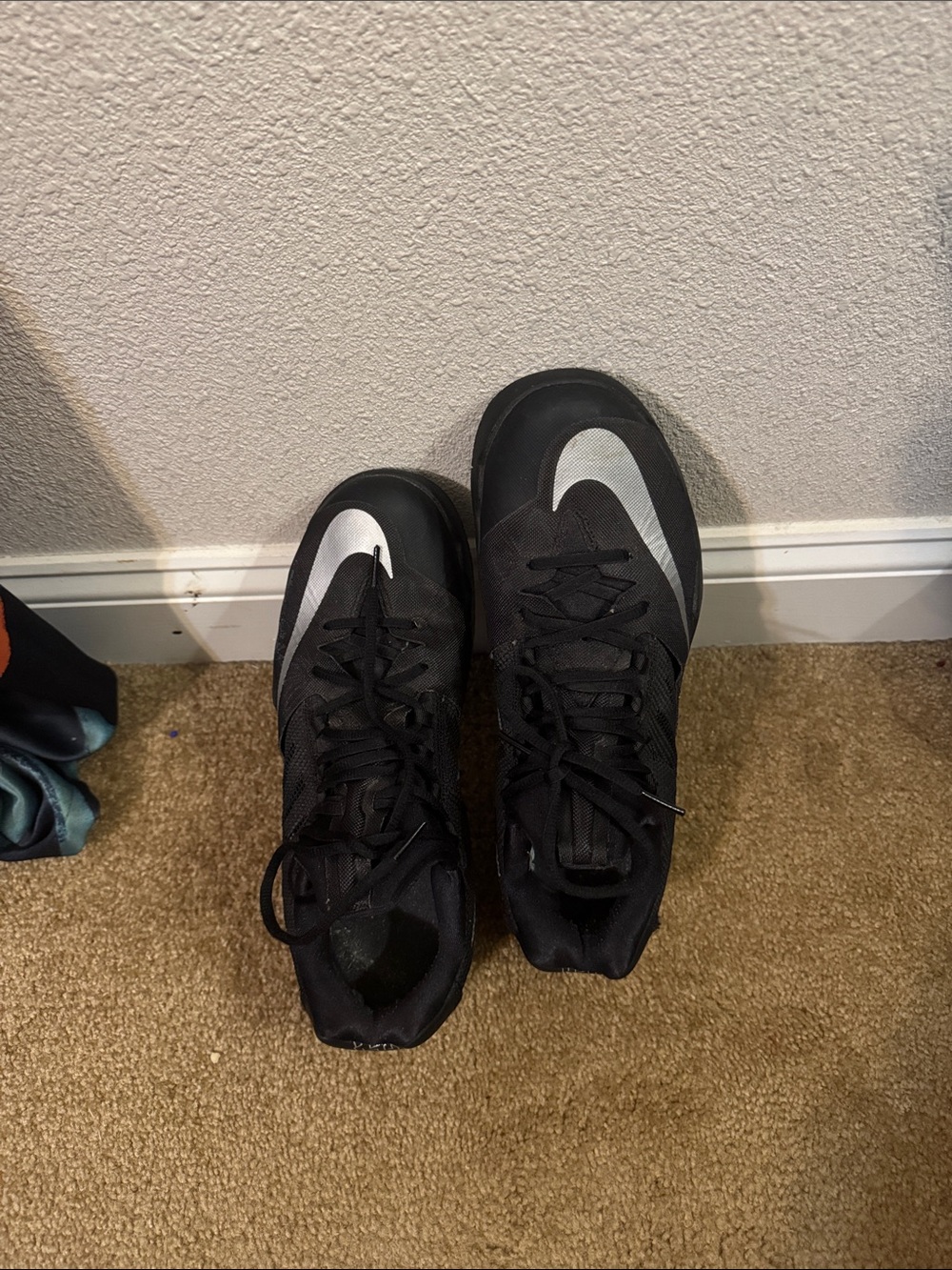 Nike Black Athletic Shoes with Silver Swoosh